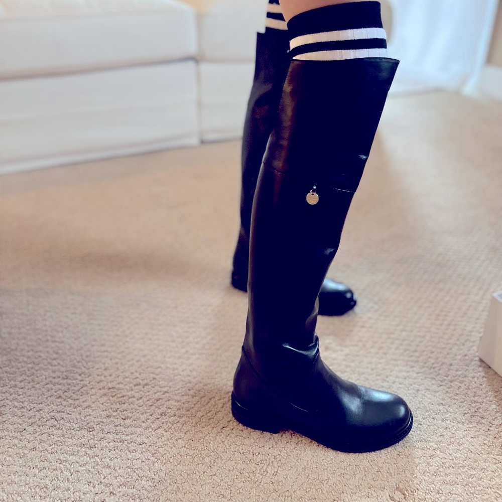 Beautiful leather tall boots for girls.